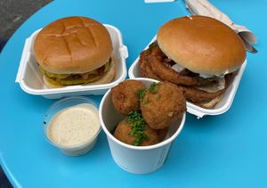 From left to right, top to bottom. Beyond burger, I cannot remember which one; Bbq chick*n burger; house sauce and mac and cheeze balls! at V Rev Vegan Diner in Manchester