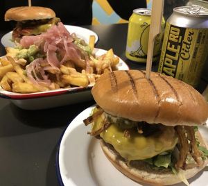 Loaded Fries and Burger with Vegan Bacon at V Rev Vegan Diner in Manchester