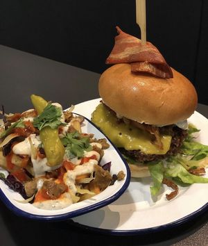 Kevin bacon burger and kebab fries   at V Rev Vegan Diner in Manchester
