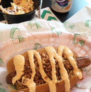 Tasty vegan hot dog with side of slaw  at V Rev Vegan Diner in Manchester