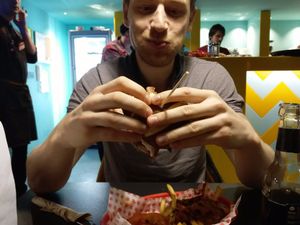 Stuffing his face! at V Rev Vegan Diner in Manchester