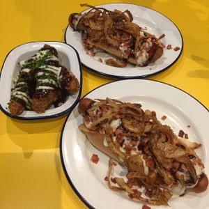 Two RANCH DEVEREAUX hotdogs with chicken tenders at V Rev Vegan Diner in Manchester