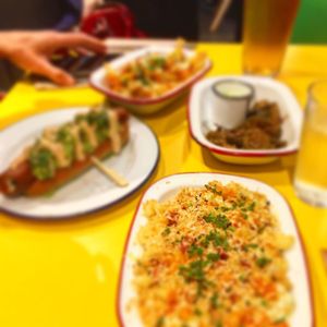 Buffalo mac-n-cheese, frickles, notorious d.o.g and loaded fries at V Rev Vegan Diner in Manchester