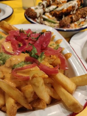 Southwest fries and buffalo salad at V Rev Vegan Diner in Manchester