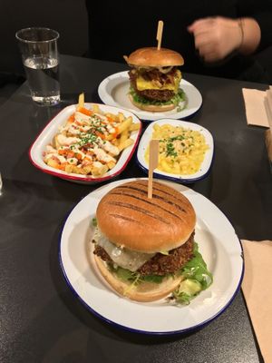 Vegan 'Fresh Avocado' burger, bacon burger, mac and cheese and loaded fries at V Rev Vegan Diner in Manchester