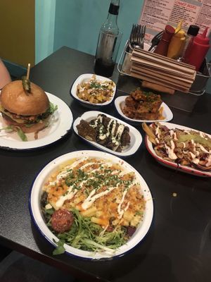 “We’ll take the lot” whopper, hot wings, bbq tenders, buffalo mac and cheese, kebabs fries, buffalo fries at V Rev Vegan Diner in Manchester
