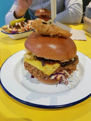 Burger with mc and Cheese in it at V Rev Vegan Diner in Manchester