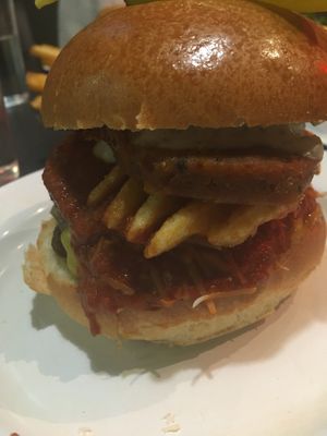 Pizza my heart burger 💓  at V Rev Vegan Diner in Manchester