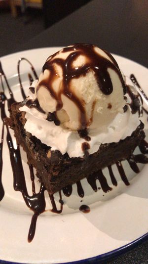 Brownie with ice cream at V Rev Vegan Diner in Manchester