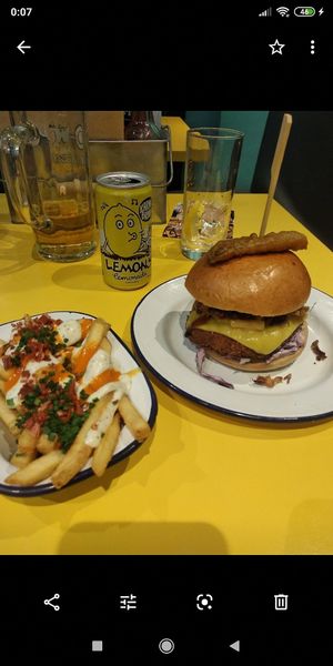 Burger and loaded fries at V Rev Vegan Diner in Manchester