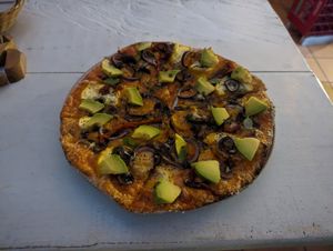 Vegetarian pizza with vegan cheese at Cafe Europa San Gil in San Gil