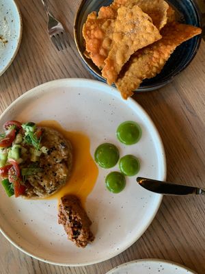 Smoke eggplant tartar with lentil cracker at The Acorn in Vancouver