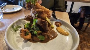 Fried oyster mushrooms, savory waffle, koji gravy 😋 at The Acorn in Vancouver