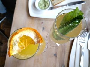 Mimosa and a strawberry cocktail at The Acorn in Vancouver