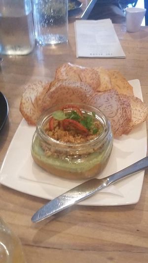 Douglas Fir + Tomato Cashew Pate, Toasted Pine Nut Gremolata, Tomato Crisp, Taro Chips at The Acorn in Vancouver