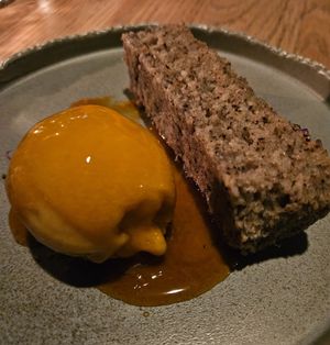 Peach sorbet and pretty dry, crumbly cornmeal cake at The Acorn in Vancouver
