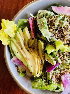Salad with toasted quinoa, pears, and watermelon radishes  at Norah - Belmont in Portland