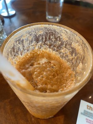 Thai Tea that I started drinking before I remembered to take a pic 😊💛  at Norah - Belmont in Portland