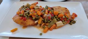 Tortos veganos con "pisto" at Agora  in Llanes