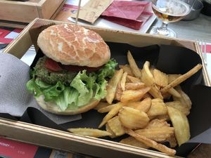 Veggie burger (vegan) and fries  at Otivm Bar in Padua