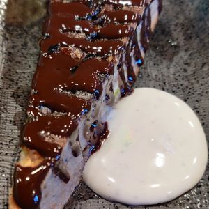 Banana walnut fudge, raw cacao sauce, coconut cardamom jam at Klorofüll in Tallinn