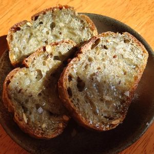 Homemade spirulina bread with seeds at Klorofüll in Tallinn