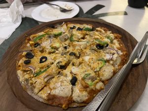 Pizza with vegan cheese   at Millets of Mewar - City Palace Rd in Udaipur
