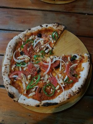 Garden Veggie pizza without cheese at Green Restaurant in Vang Vieng