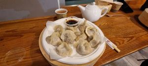 Pumpkin leek and wood ear mushroom dumplings with spicy soy sauce at Parnik Chmielna in Warsaw