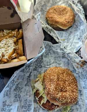 Burger and chicken sandwich with poutine fries at Odd Burger in Calgary