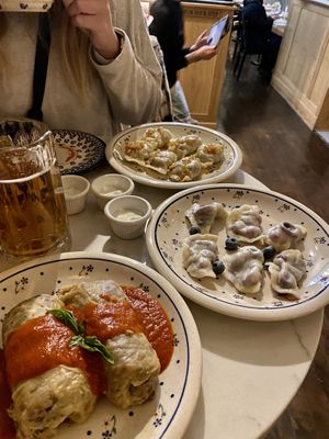 Stuffed cabbage, blueberry Pierogi, sauerkraut and mushroom pierogi  at Pierozek in Brooklyn