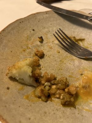Last bite of cauliflower dish  at Cuculia in Florence
