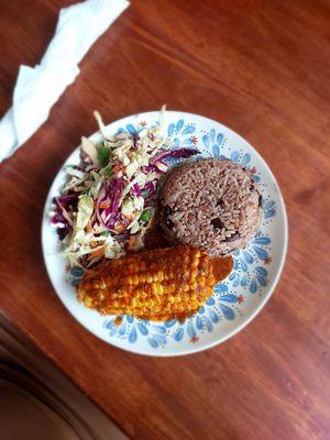 Carribean corn cob with rice/peas and coleslaw at The Jerk Spot in Pai