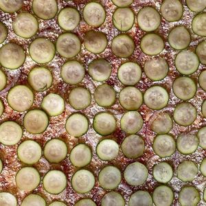 Summer organic zucchini veggie pizza in the making. at The Mark Restaurant in Olympia