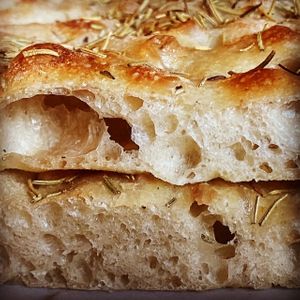 Our Pizza alla Romana is both delicious and healthy. We use a precise mix of flour, water, sour dough yeast, extra virgin olive oil, and sea salt. With a dough maturation time at 48 to 54 hours. No hidden animal fats in our preparation. at The Mark Restaurant in Olympia