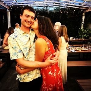 Bride and Groom celebrating with family on patio... at The Mark Restaurant in Olympia