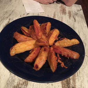 Apple fritters with maple syrup & cinnamon at Vegetarian Haven in Toronto