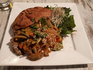 Coconut curry seitan bread bowl. My favorite item on the menu!  at Vegetarian Haven in Toronto
