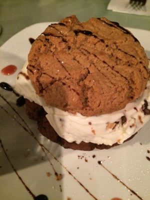 Cookie Sandwich -- Almond Bark Soy Ice Cream between a Chocolate Cookie and a Cashew Cookie at Vegetarian Haven in Toronto