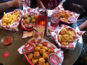 Wings, fries, smiley faces and many a dipping sauce.  at Bunk in Wolverhampton