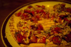 The tomatoes (with spices and tahini) on toasted flat bread.  at Salterio in Barcelona