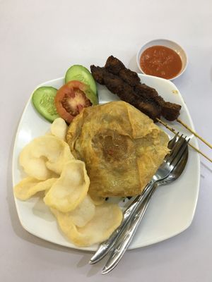 Nasi Goreng (w/ fake egg :D) and two sate skewers at Kehidupan Tidak Pernah Berakhir in Bandung