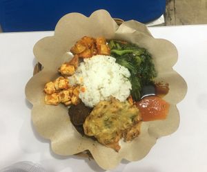 Rice with a variety of sides from the buffet at Kehidupan Tidak Pernah Berakhir in Bandung