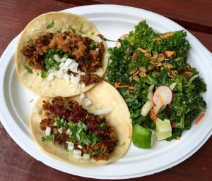 Two lentil chorizo tacos (one with an arbol sauce and the other with Cheerwine habanero) and a fiambre salad on the side. at The Grey Eagle Taqueria in Asheville