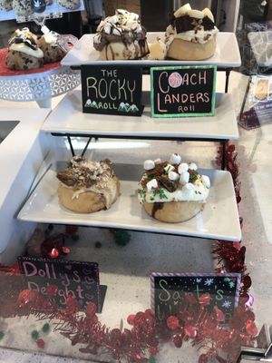 Display with featured local/special rolls  at Cinnaholic in Gallatin