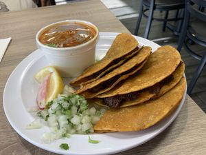 Birria tacos with consommé   at Viva Vegan Diner in Upland