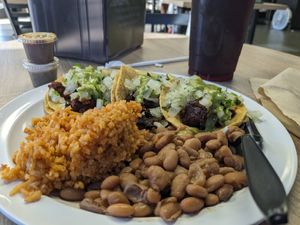 Taco Trio Platter with rice and beans. Delicious. at Viva Vegan Diner in Upland