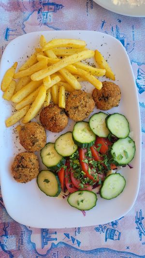 Falafel with frieds and salad at Taverna Perissa in Santorini