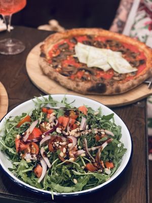 Rocket salad and hero pizza  at BrewDog - Marais in Paris