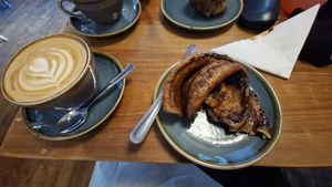 Oat latte and Cinnamon Bun at King Alfred's Kitchen in Shaftesbury